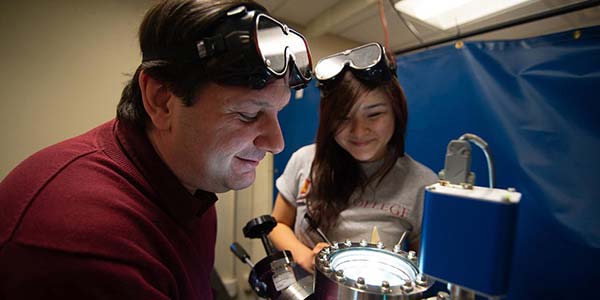 Professor showing student demonstration